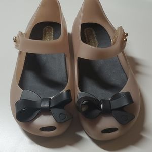 Mini Melissa size 8T. Taupe and Black Bow.